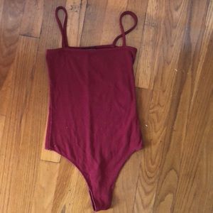 Red Brandy Melville Body Suit.